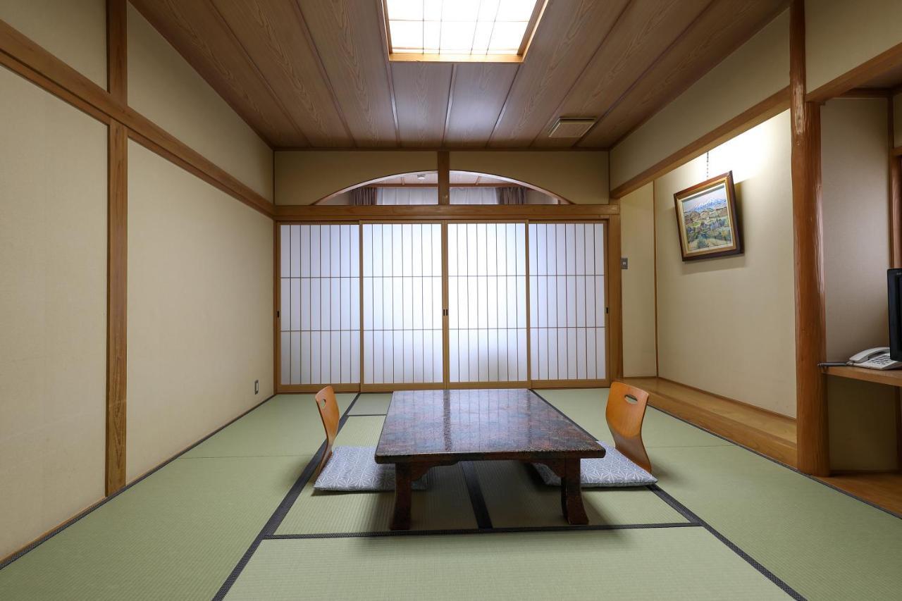 Tsukasaya Ryokan Tsuruoka Bagian luar foto