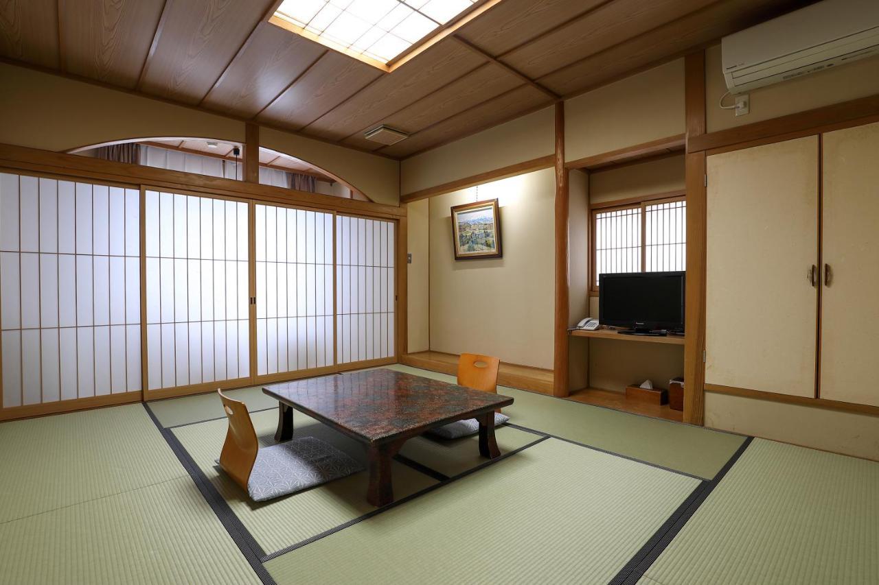 Tsukasaya Ryokan Tsuruoka Bagian luar foto