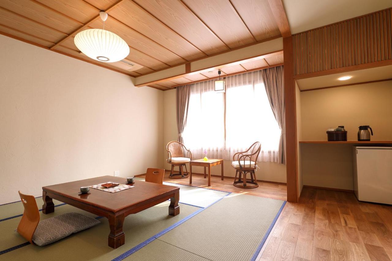 Tsukasaya Ryokan Tsuruoka Bagian luar foto