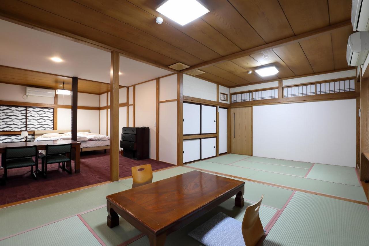 Tsukasaya Ryokan Tsuruoka Bagian luar foto