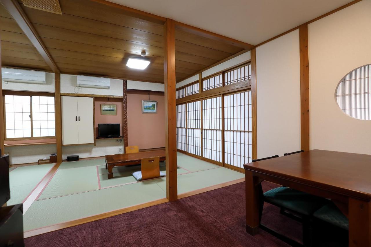 Tsukasaya Ryokan Tsuruoka Bagian luar foto