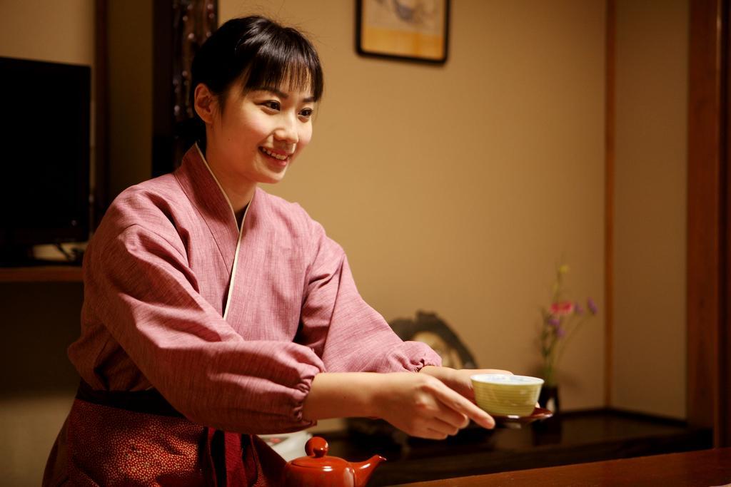 Tsukasaya Ryokan Tsuruoka Bagian luar foto